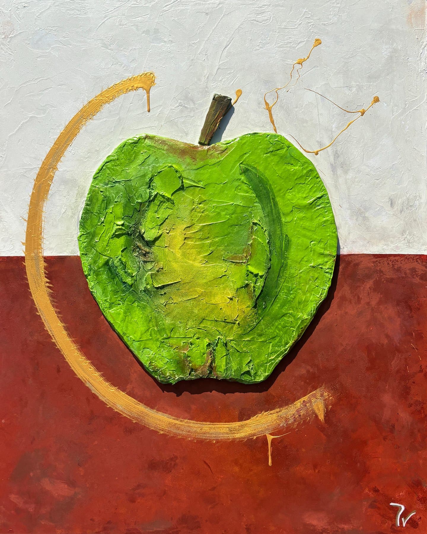 Red apple and gold — view 1